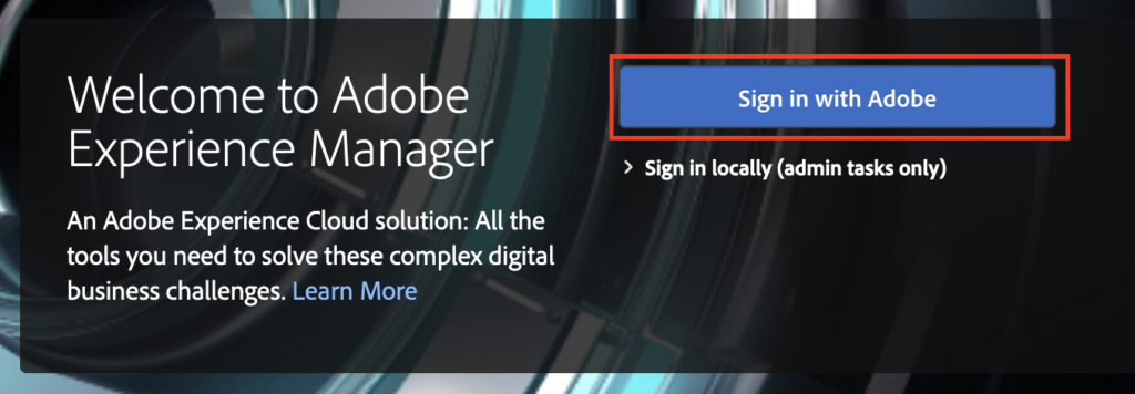 AEM login screen with configured Adobe IMS authentication and "Sign in with Adobe" button